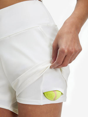 Inside view of pocket on white women's high waist 2 in 1 quick dry shorts with 7 pockets