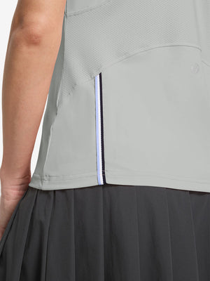 Detail view of hem design on light grey women's breathable 1/4 zip pullover golf shirts