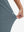 View showing loose fit of grey blue women's lightweight athletic sweatpants