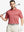 Model half-body front pose with golf club in ORANGE Performance Ananas Jacquard Polo