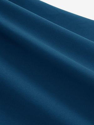 Close-up texture of blue women's breathable 1/4 zip pullover golf shirts fabric showing breathable weave detail.