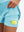 Detail view of inner pocket on lake green women's stretch a-line golf skort with 7 pockets