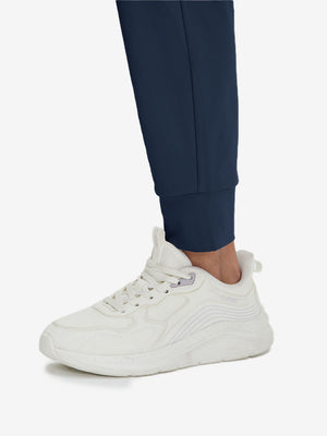 Detail view of hem on navy women's lightweight athletic sweatpants
