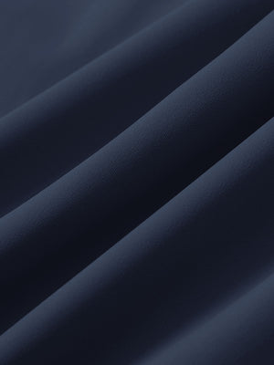 Close-up texture of navy 4 way stretch breathable workout athletic shorts fabric showing weave detail.
