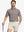 Front half-body shot of model holding golf club, wearing Sport Fit Stripe Polo in Brown Stripe