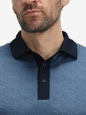 Front shot from nose to chest of model wearing navy lines stylish full print contrast collared golf polo shirts