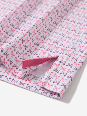 Detail view of hem on keys pattern stylish full print contrast collared golf polo shirts