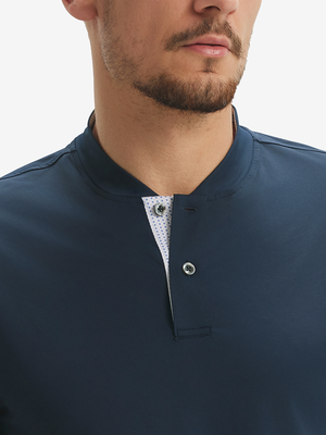 Close-up of model in navy moisture-wicking short sleeve henley shirt, nose to chest front view.